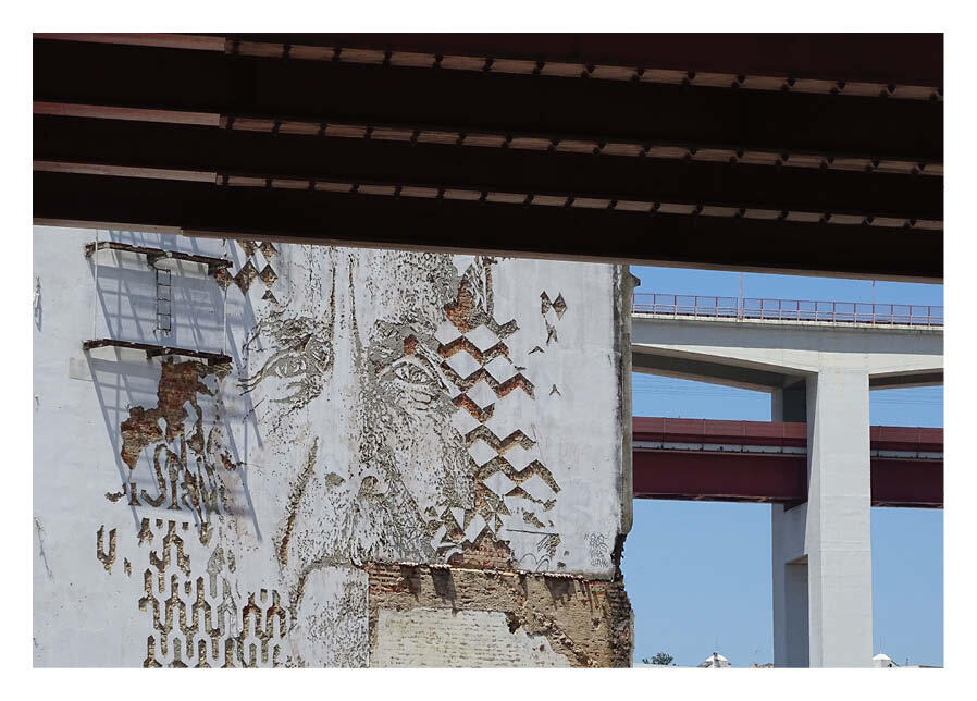 What can street art reveal about a place? Street artist Vhils carves through layers of stone, plaster and brick - exposing the history of the building itself.