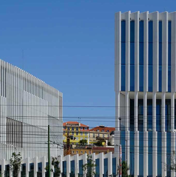 Modern art museum, Lisbon - set in contrast with the historic architecture it frames, highlighting the layering of old and new within the city. Modern art museum, Lisbon - set in contrast with the historic architecture it frames, highlighting the layering of old and new within the city.